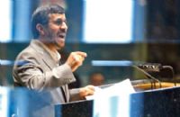 A man is speaking at a podium in front of a microphone.